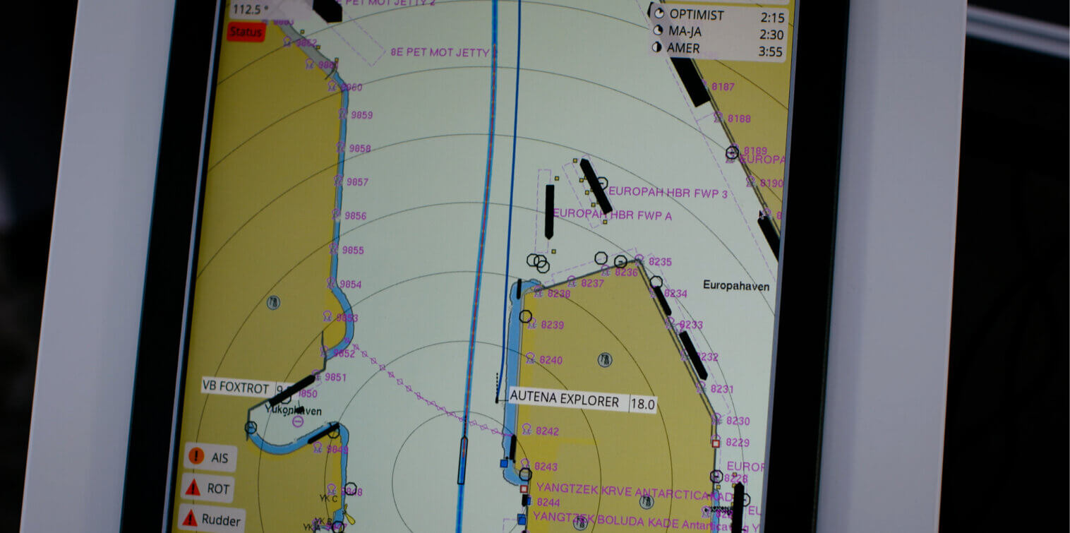 Electronic navigation display showing vessel traffic and route planning for autonomous inland shipping in the Port of Rotterdam.