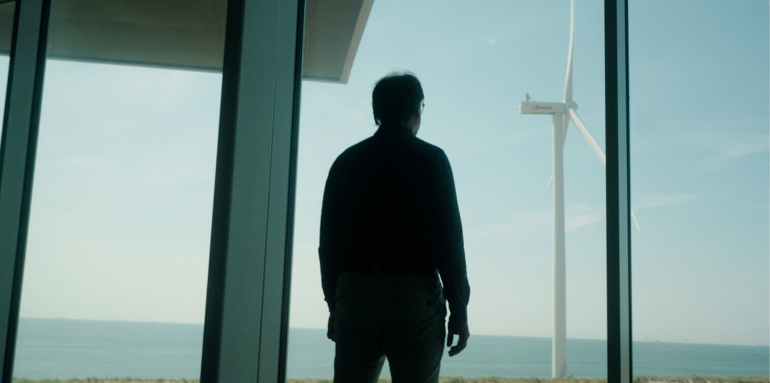 Thierry Verduijn overlooking the North Sea from the Port of Rotterdam, where autonomous and sustainable shipping solutions are being developed.